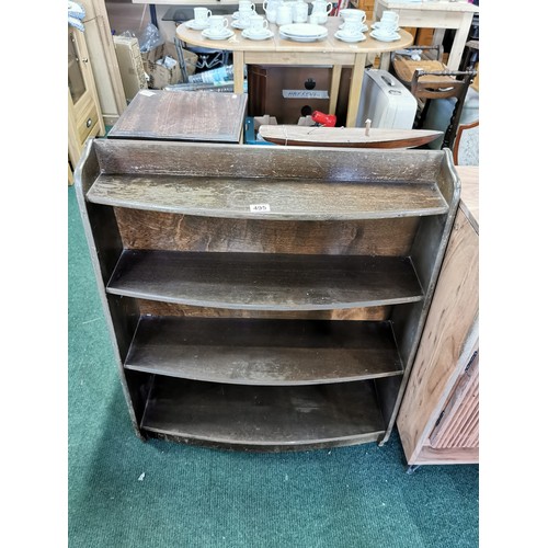 495 - Vintage oak C.W.S. stamped 4 shelf bowed bookcase height 92cm, length 76cm, width 24cm.