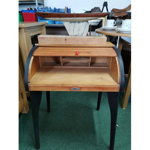 499 - Mid century child's roll top bureau by Pennine, along with a wooden boat on stand, desk stands at 70... 