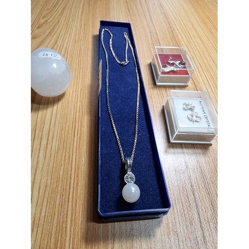 346 - A 925 silver faux pearl pendant and chain along with 2 pairs of 925 silver earrings and a selenite c... 