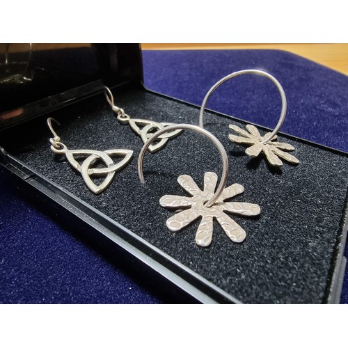 352 - 2 pairs of 925 silver earrings including a hooped flower pair and a Celtic style pair, both clean an... 