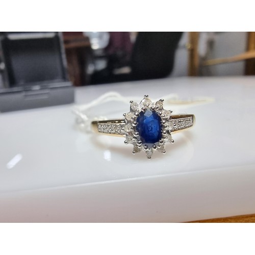 387 - A hallmarked pretty 9ct yellow gold sapphire and diamond ring, total of 0.10ct diamond and approx 0.... 