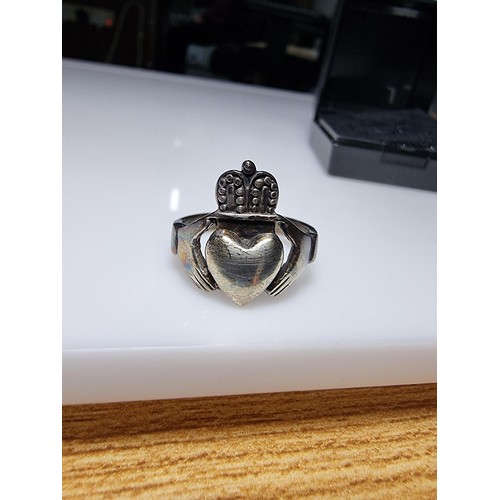 357 - A large 925 silver traditional Claddagh ring marked 925, still has its original vintage silver patin... 