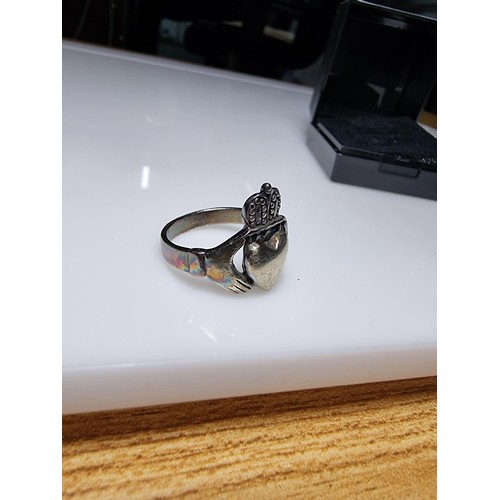 357 - A large 925 silver traditional Claddagh ring marked 925, still has its original vintage silver patin... 