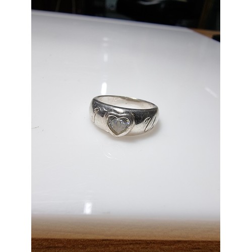 365 - A 925 silver ring with a heart shaped CZ crystal to the centre marked 'I heart you', in good clean c... 