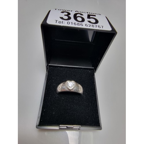 365 - A 925 silver ring with a heart shaped CZ crystal to the centre marked 'I heart you', in good clean c... 