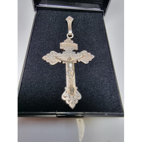 367 - A large white metal crucifix pendant, handmade in France. Presenting good detail, in good clean cond... 