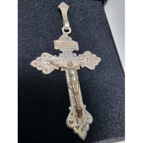 367 - A large white metal crucifix pendant, handmade in France. Presenting good detail, in good clean cond... 