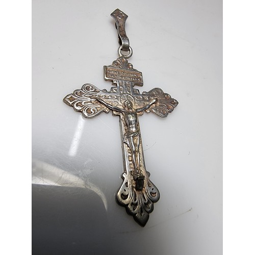 367 - A large white metal crucifix pendant, handmade in France. Presenting good detail, in good clean cond... 