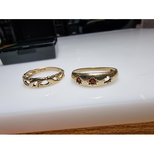 402 - 2x hallmarked 9ct yellow gold rings to include a ring with a pierced design in excellent clean condi... 