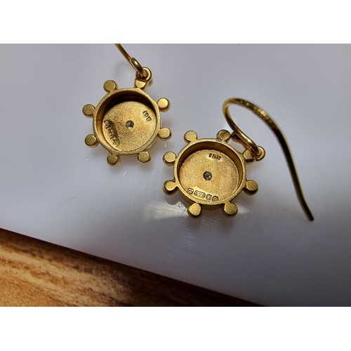 404 - A pair of pretty 9ct yellow gold drop earrings both inset with a small diamond, in as new condition ... 