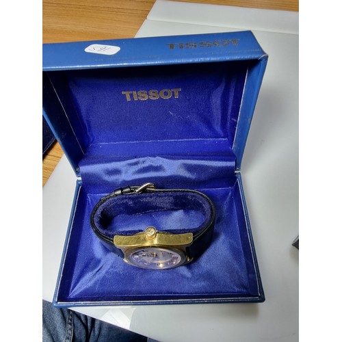 377 - 2 good quality cased boxed watches to include a Tissot PR 516 electronic gents wrist watch and an Ac... 