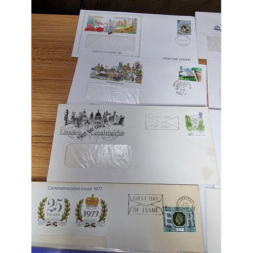 379 - A quantity of first day covers along with 2x English ten shilling notes, Britain's first decimal coi... 