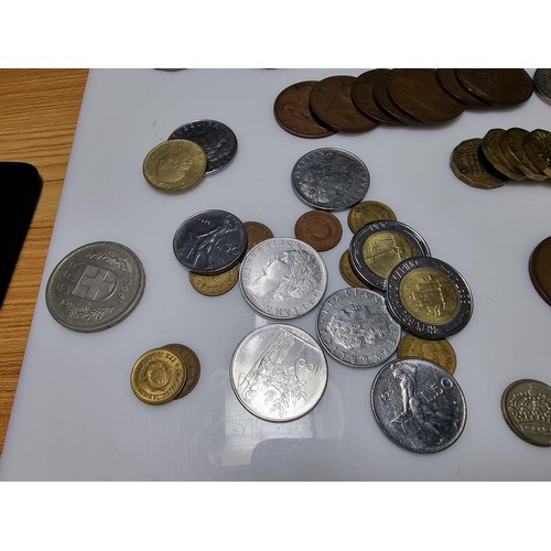 380 - A large quantity of various British and world coins to include a quantity of crowns, Irish coins, ol... 