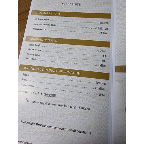 381 - A large 4ct moissanite diamond by GRA (gemological research agency) with full COA and moissanite rep... 