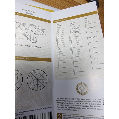 381 - A large 4ct moissanite diamond by GRA (gemological research agency) with full COA and moissanite rep... 