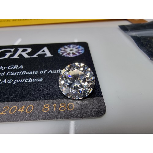 383 - A large 6ct (12mm) moissanite diamond by GRA with full COA and moissanite report. this moissanite di... 