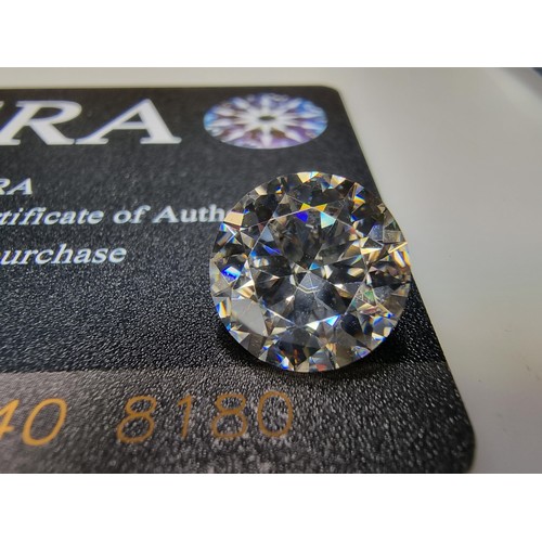 383 - A large 6ct (12mm) moissanite diamond by GRA with full COA and moissanite report. this moissanite di... 