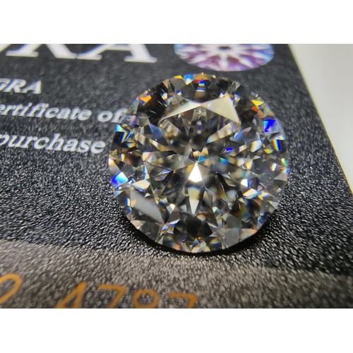 384 - A large 6ct (12mm) moissanite diamond by GRA with full COA and moissanite report. this moissanite di... 