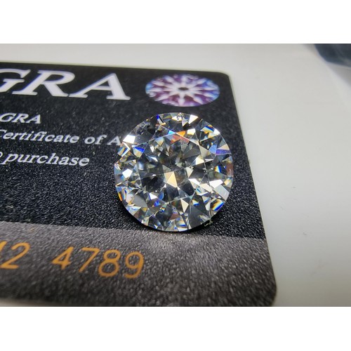 385 - A large 7ct (12.5mm) moissanite diamond by GRA with full COA and moissanite report. this moissanite ... 