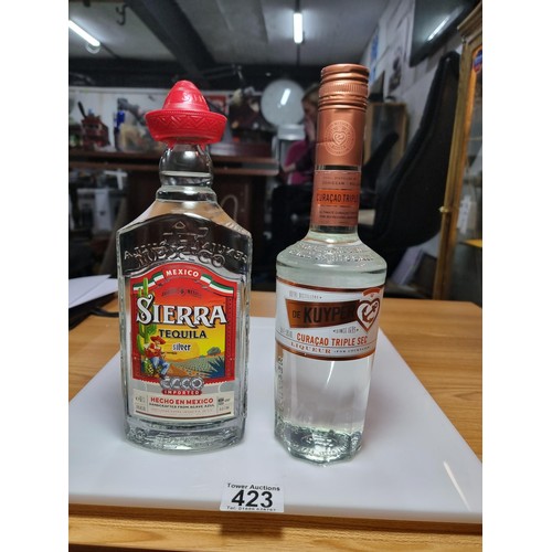 423 - 2 new and sealed bottles of liquor to include sierra tequila silver, bottle 50cl and a De Kuyper Cur... 