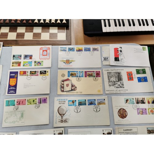 301 - Large quantity of British stamp presentation pack with stamp silks along with  a large quantity of v... 