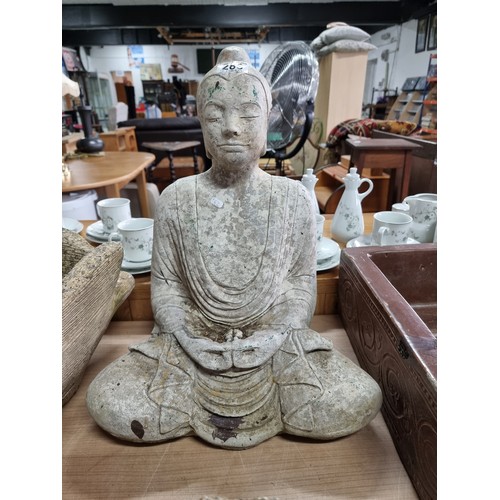 283 - Well formed concrete garden Buddha ornament  in good order, height 48cm length 36cm depth 25cm