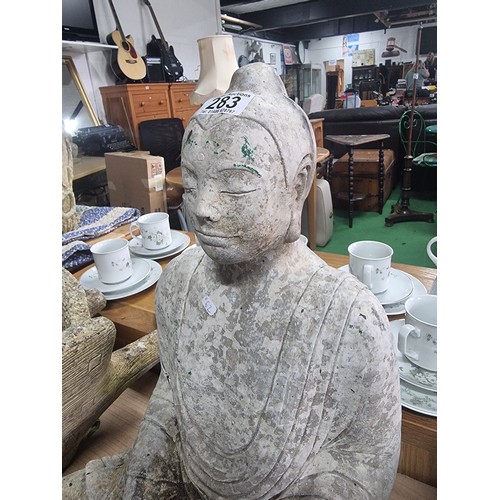 283 - Well formed concrete garden Buddha ornament  in good order, height 48cm length 36cm depth 25cm