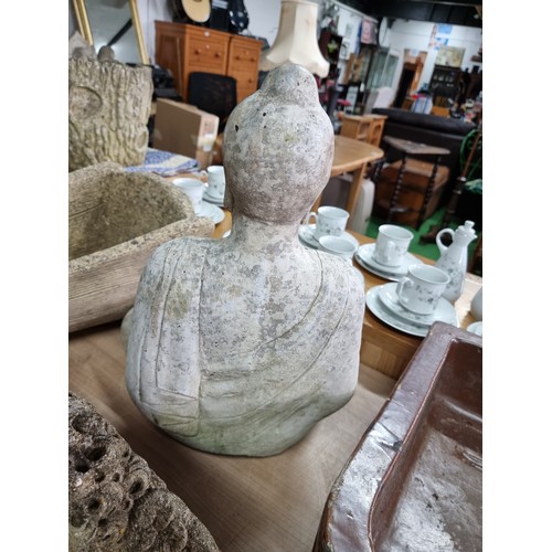 283 - Well formed concrete garden Buddha ornament  in good order, height 48cm length 36cm depth 25cm