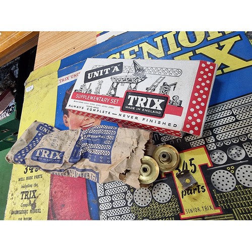 4 - A vintage boxed Senior Trix 345 construction set complete with all the parts fitted in original colo... 