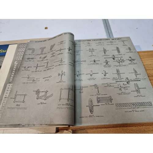 4 - A vintage boxed Senior Trix 345 construction set complete with all the parts fitted in original colo... 