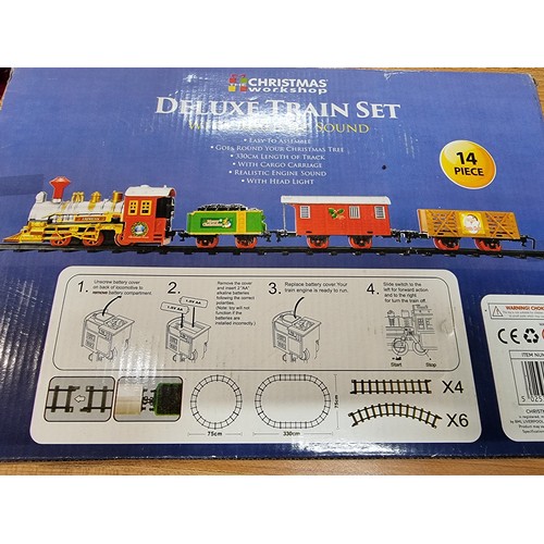 6 - A boxed as new Christmas workshop deluxe trainset to go round a Christmas tree, 330cm length of trac... 