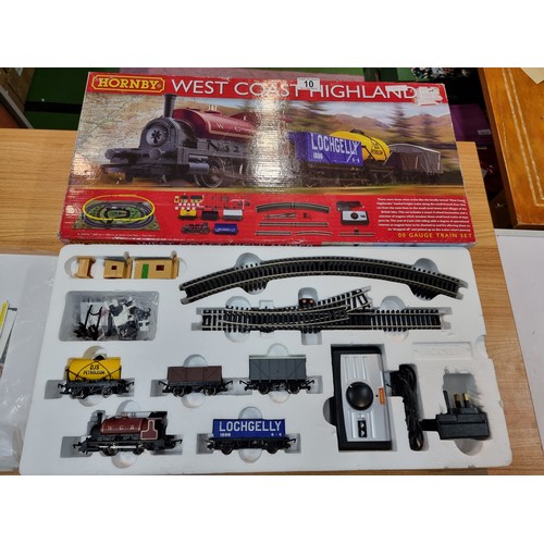 10 - A boxed Hornby R1157 Westcoast highlander trainset in very clean complete condition. Including its t... 