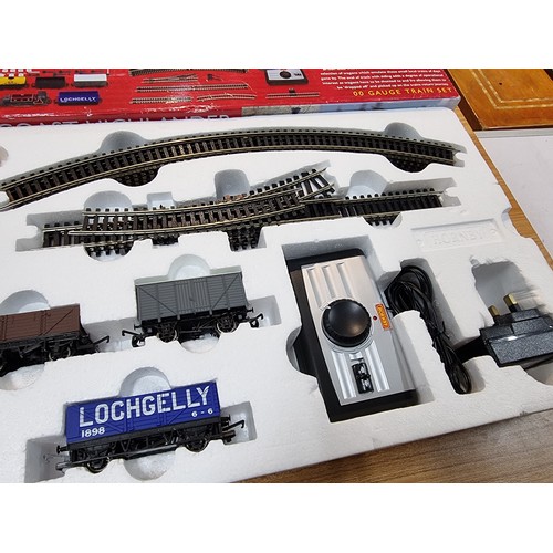 10 - A boxed Hornby R1157 Westcoast highlander trainset in very clean complete condition. Including its t... 