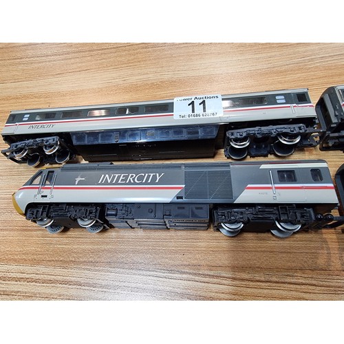 11 - A Hornby intercity 125 four car set with working lights, swallow livery including loco DVT and 2 coa... 