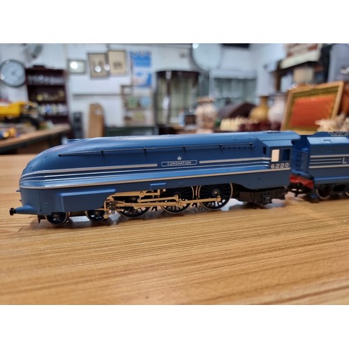 12 - A Hornby OO gauge Coronation class LMS blue & silver locomotive and tender (6220) unboxed in very cl... 