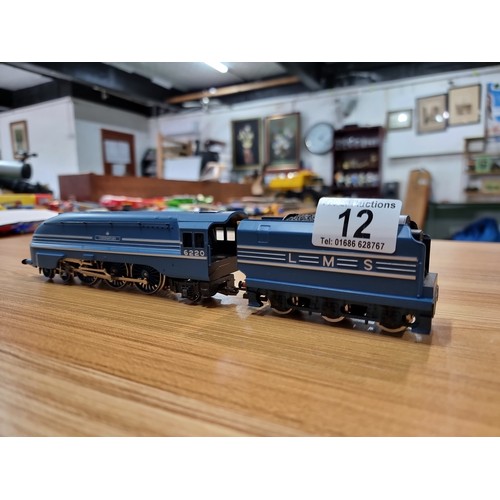 12 - A Hornby OO gauge Coronation class LMS blue & silver locomotive and tender (6220) unboxed in very cl... 