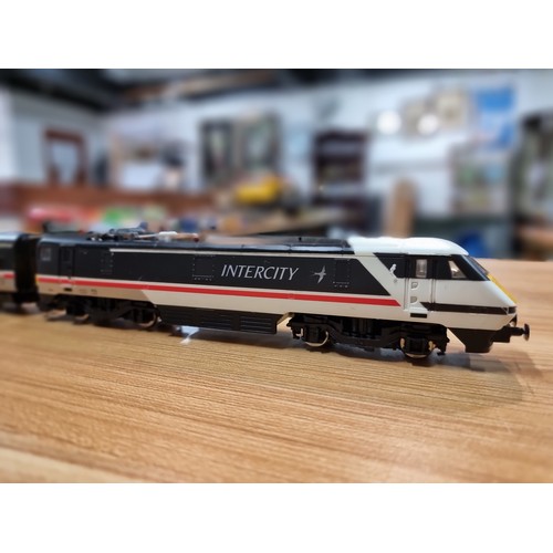 13 - A Hornby intercity 225 locomotive and DVT in swallow livery, unboxed in clean condition and runs.