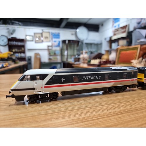 13 - A Hornby intercity 225 locomotive and DVT in swallow livery, unboxed in clean condition and runs.