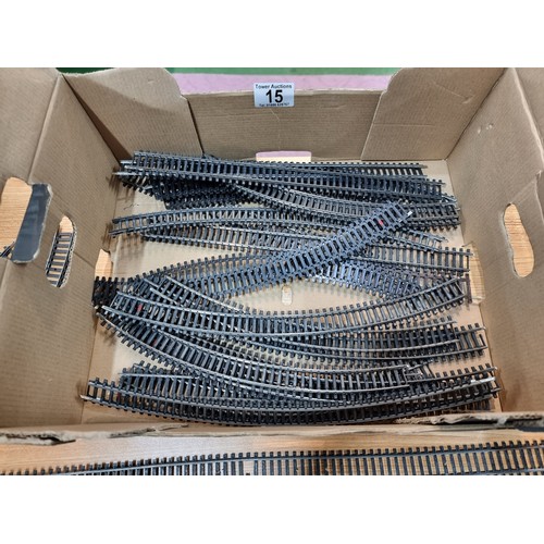 15 - A box containing a large quantity of OO gauge curved and straight track pieces, some with points alo... 