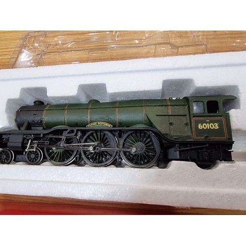 18 - A boxed Hornby R3086 Flying Scotsman locomotive and tender, appears to have been repainted into Brit... 