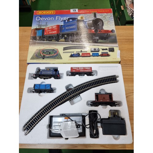 19 - An as new boxed Hornby R1121 Devon Flyer OO gauge trainset in unused condition.