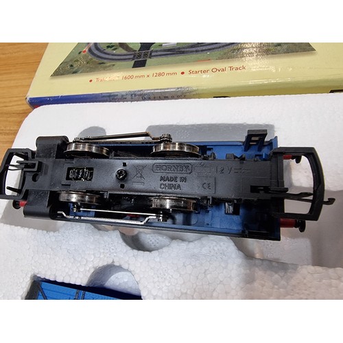 19 - An as new boxed Hornby R1121 Devon Flyer OO gauge trainset in unused condition.