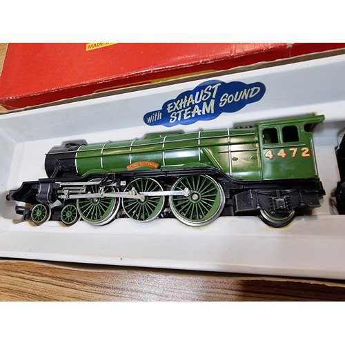 22 - A boxed Hornby R855 LNER Flying Scotsman locomotive and tender 4472 with exhaust steam sound in exce... 