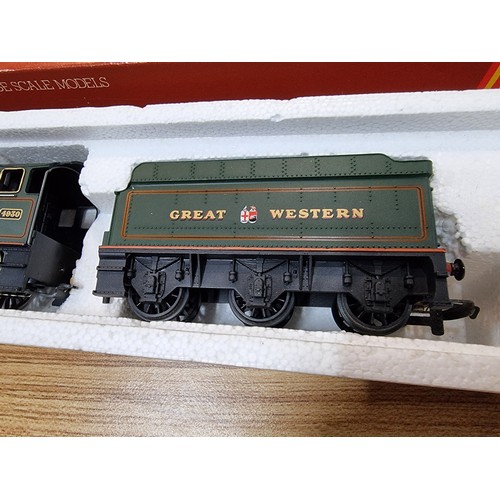 24 - A boxed Hornby R313G GWR Hagley Hall locomotive and tender, boxed in very clean condition, tested as... 