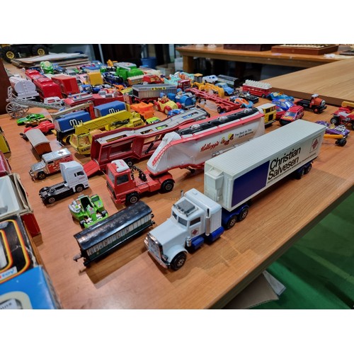 25 - A large collection of various vintage diecast vehicles to include some good long truck lorries inclu... 