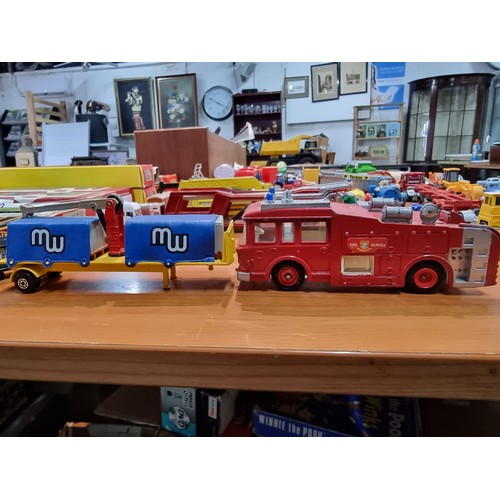 25 - A large collection of various vintage diecast vehicles to include some good long truck lorries inclu... 