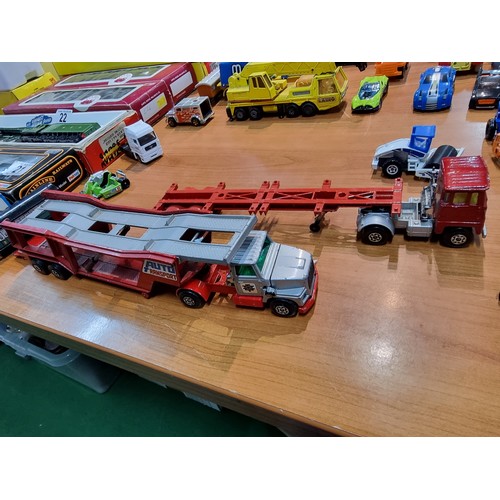 25 - A large collection of various vintage diecast vehicles to include some good long truck lorries inclu... 