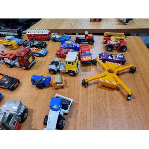 25 - A large collection of various vintage diecast vehicles to include some good long truck lorries inclu... 