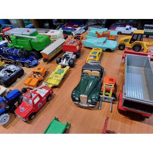 25 - A large collection of various vintage diecast vehicles to include some good long truck lorries inclu... 