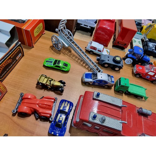 25 - A large collection of various vintage diecast vehicles to include some good long truck lorries inclu... 